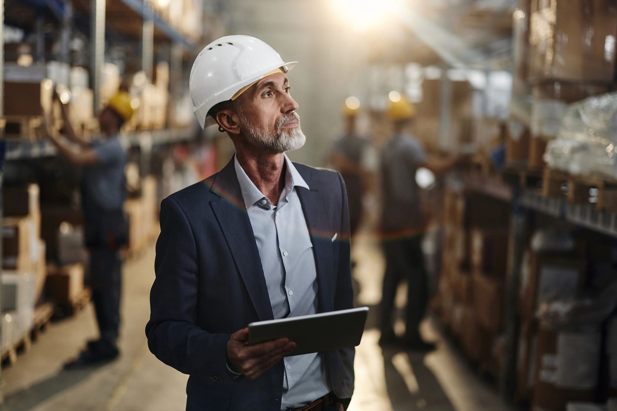 Technician using a tablet for inspection and documentation