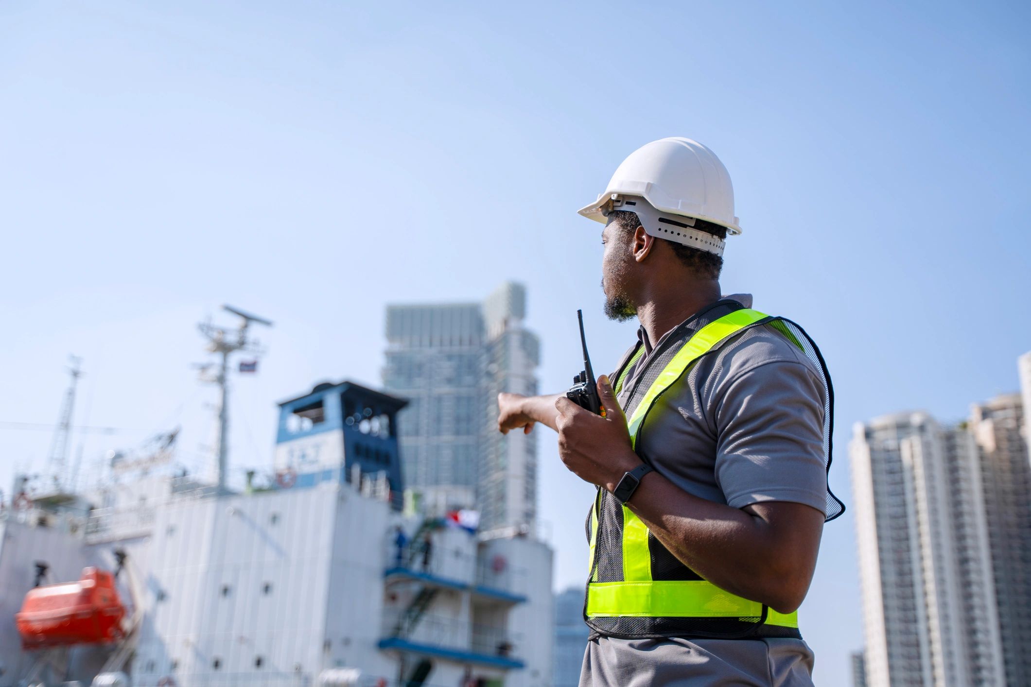 Marine engineer reviewing vessel systems on deck